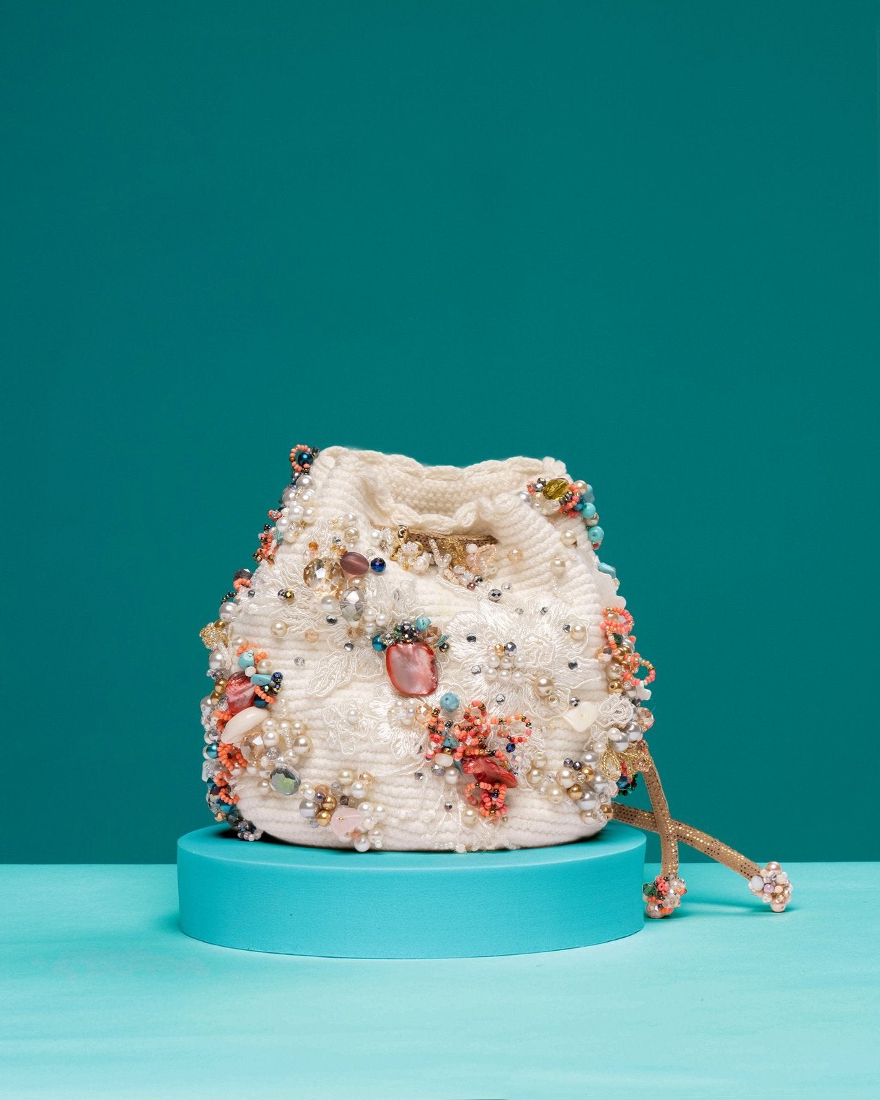 Barnacle Mini Crossbody Bag with pearl and shell embellishments